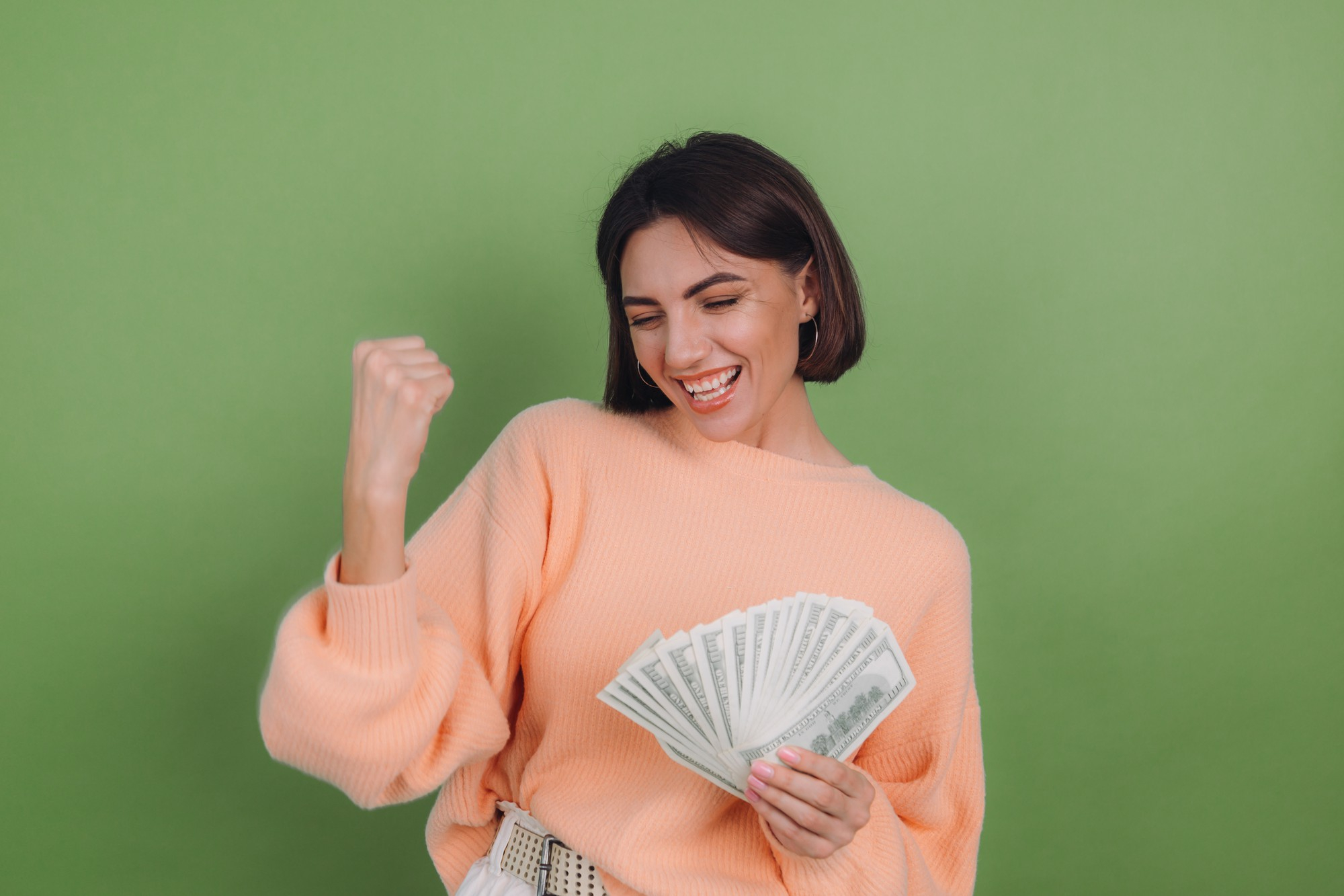 young woman happy with profit