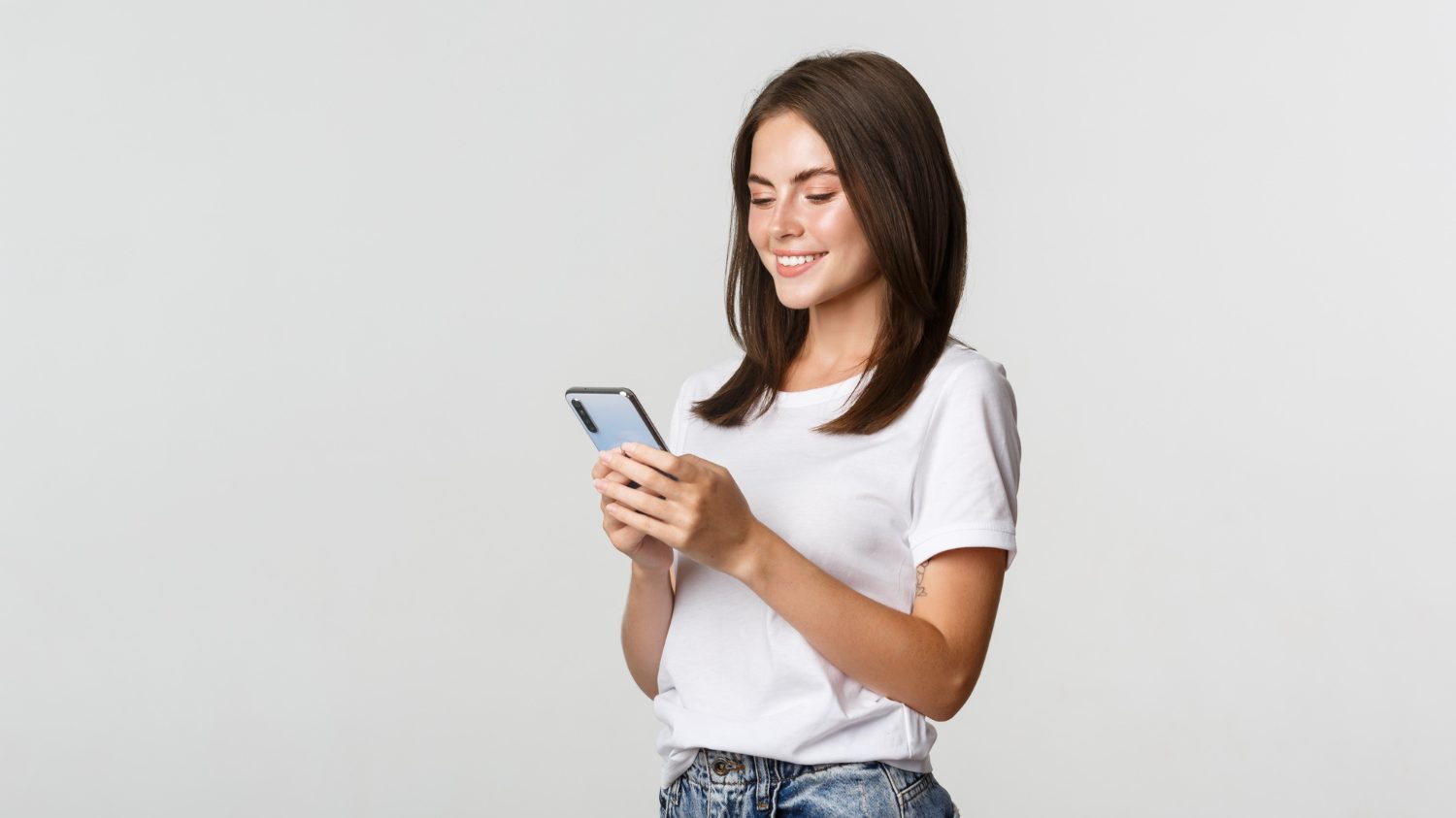 young woman using online bank at smartphone