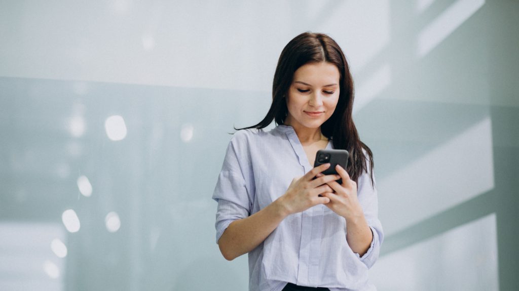 Business woman using smartphone
